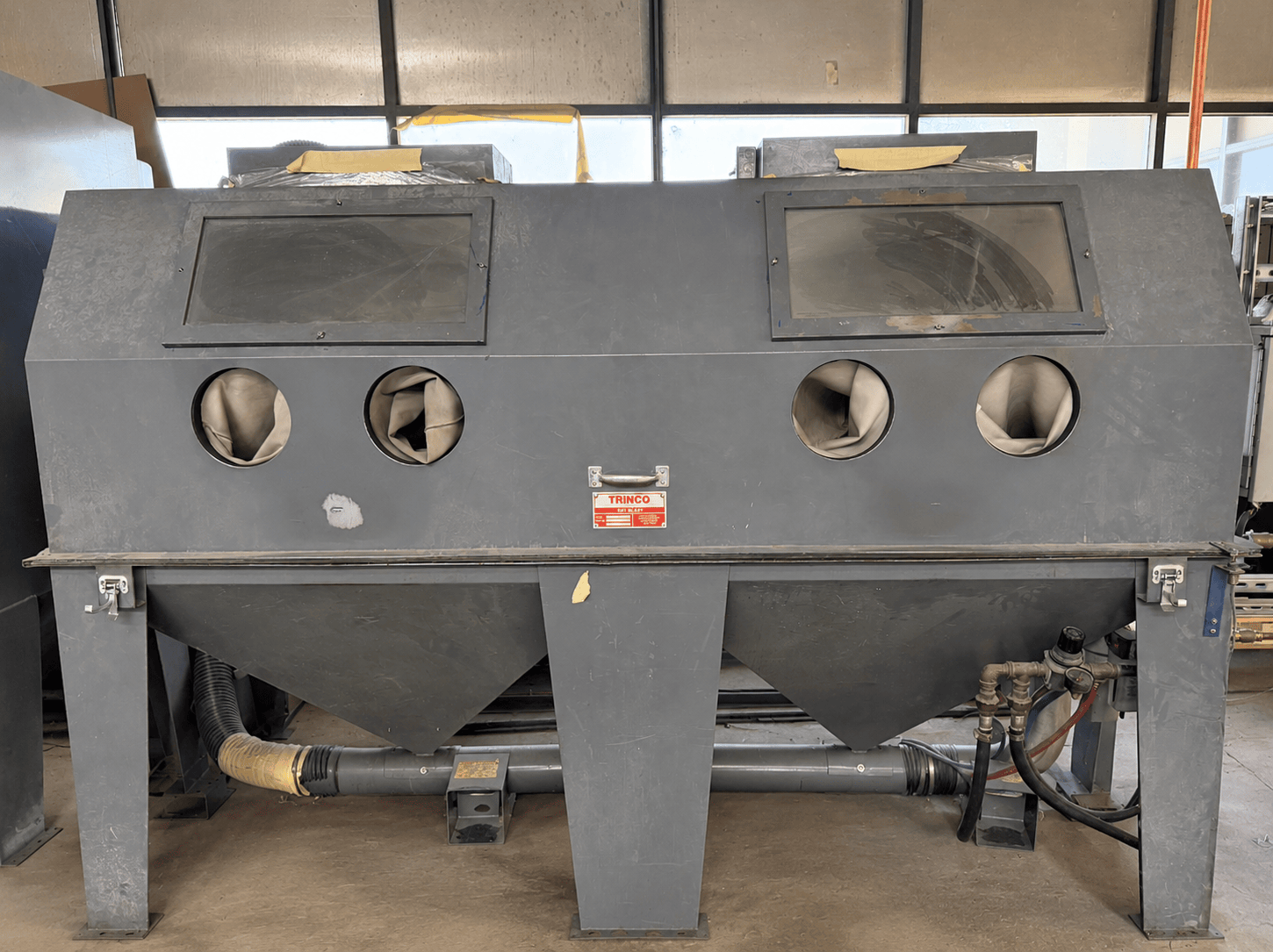 Bead blasting cabinet used for abrasive surface preparation