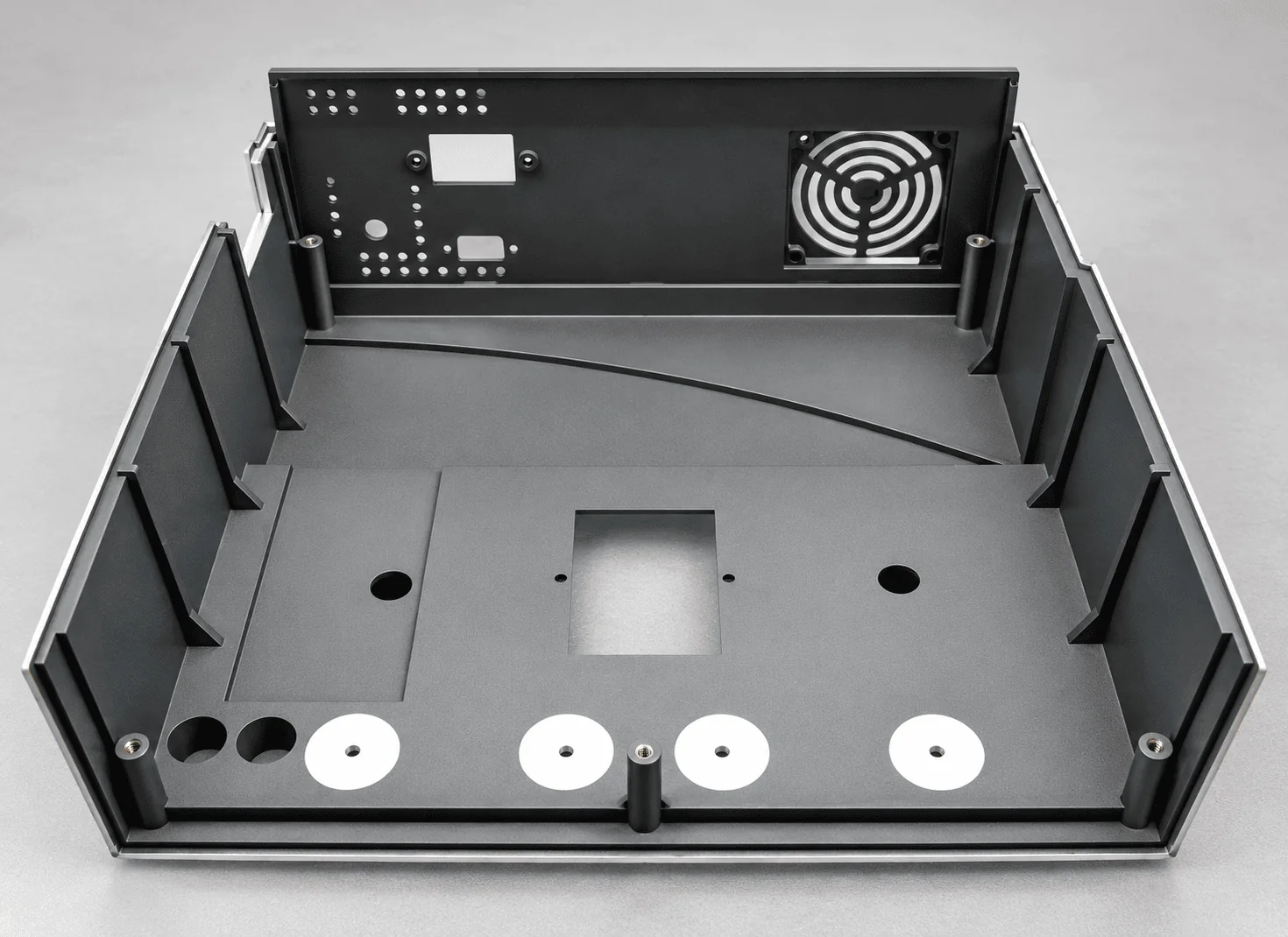 Electronic enclosure with conductive EMI coating applied to its interior surfaces